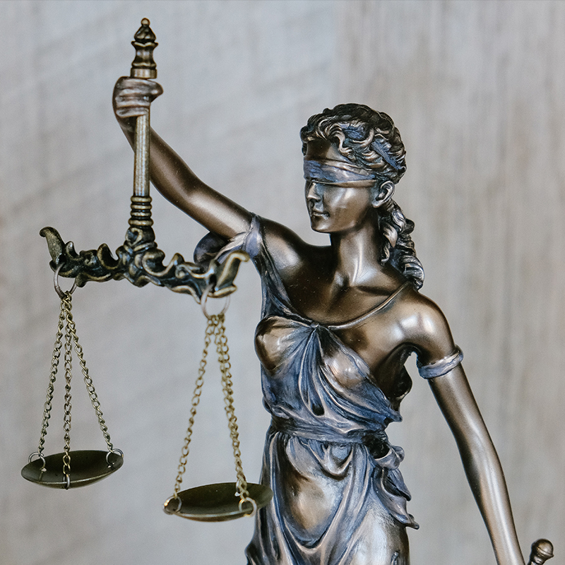 A picture of lady justice with a blindfold